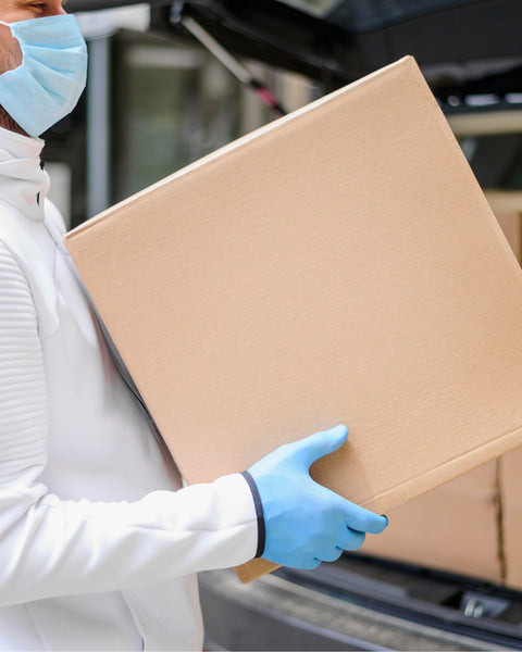 Person holding box to delivery